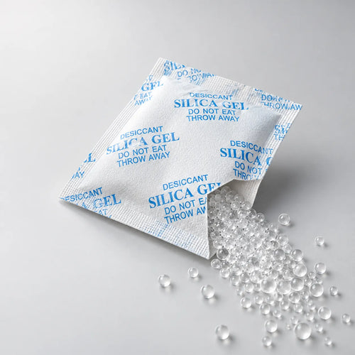 Silica gel beads inside a breathable desiccant sachet