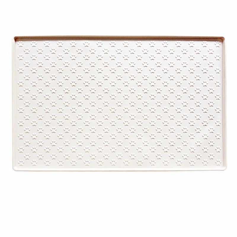 Raised-edge silicone feeding mat in Milk White